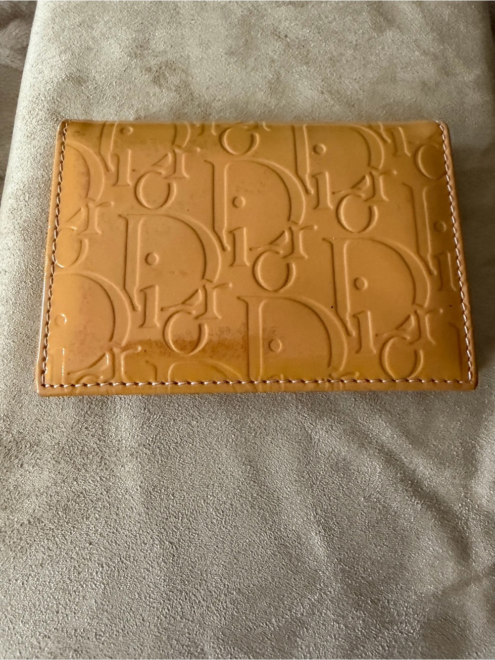 Dior Embossed Logo Patent Leather Card in Muted Yellow with Soft Pink Interior.